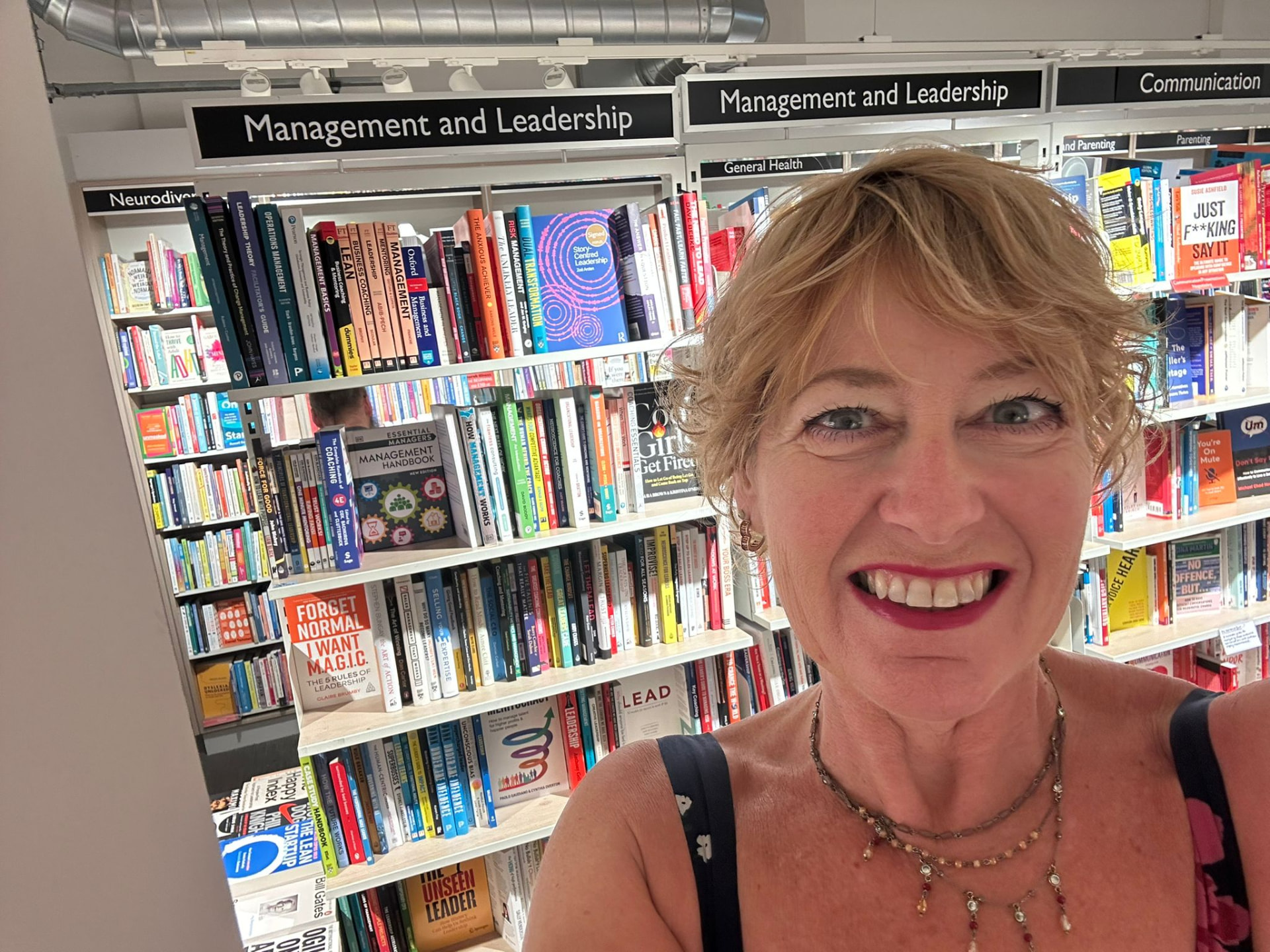 A Brandspire author in a bookshop's management and leadership section